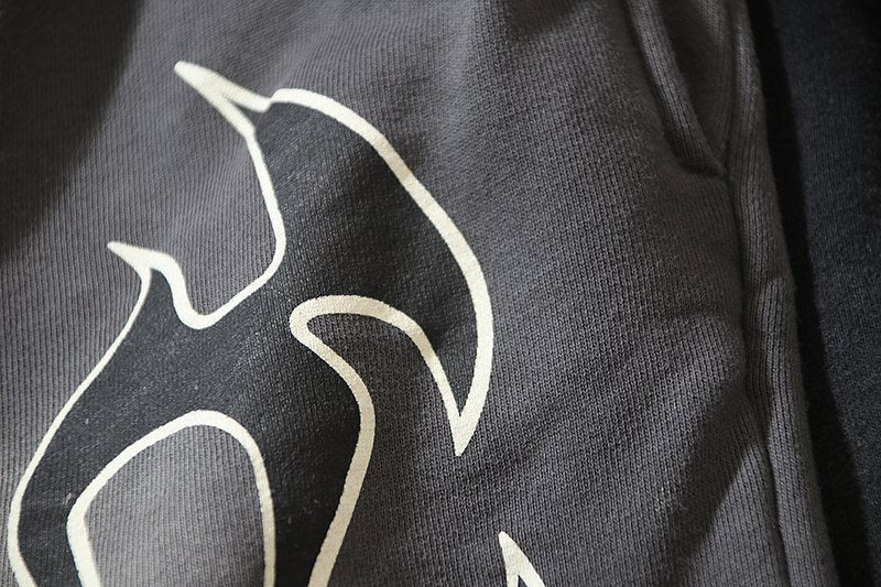 Hellstar Washed Flame Graphic Shorts — fabric_closeup