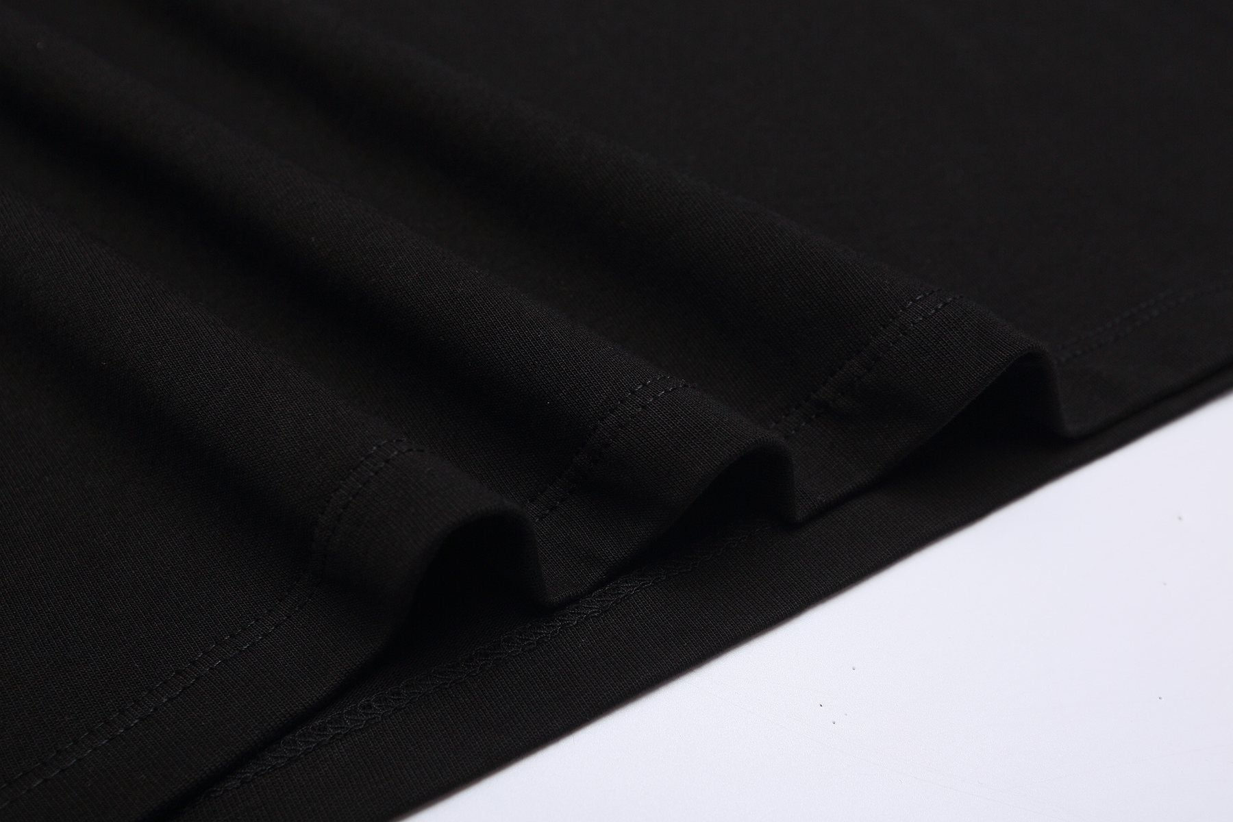 ESSENTIALS Stacked Text Graphic T-Shirt — detail