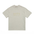 ESSENTIALS 1977 Tonal Wordmark Mock-Neck T-Shirt — front