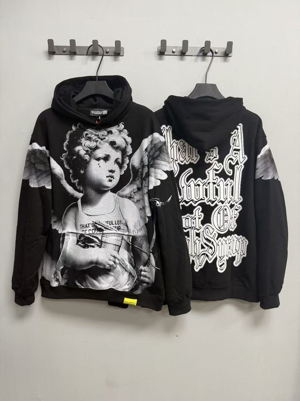 THAT'S A AWFUL LOT OF COUGH SYRUP Angel Tears Graphic Hoodie — context