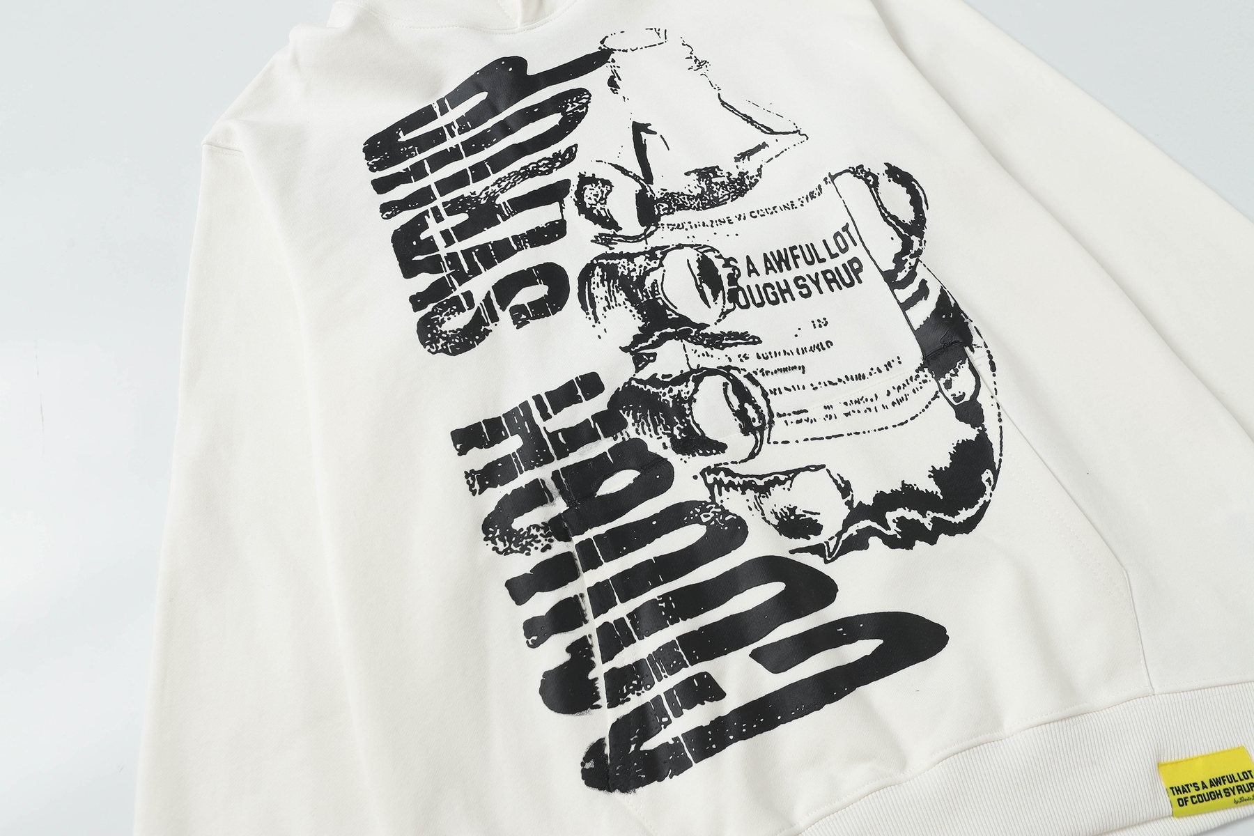 THAT'S A AWFUL LOT OF COUGH SYRUP Warning Graphic Hoodie — detail