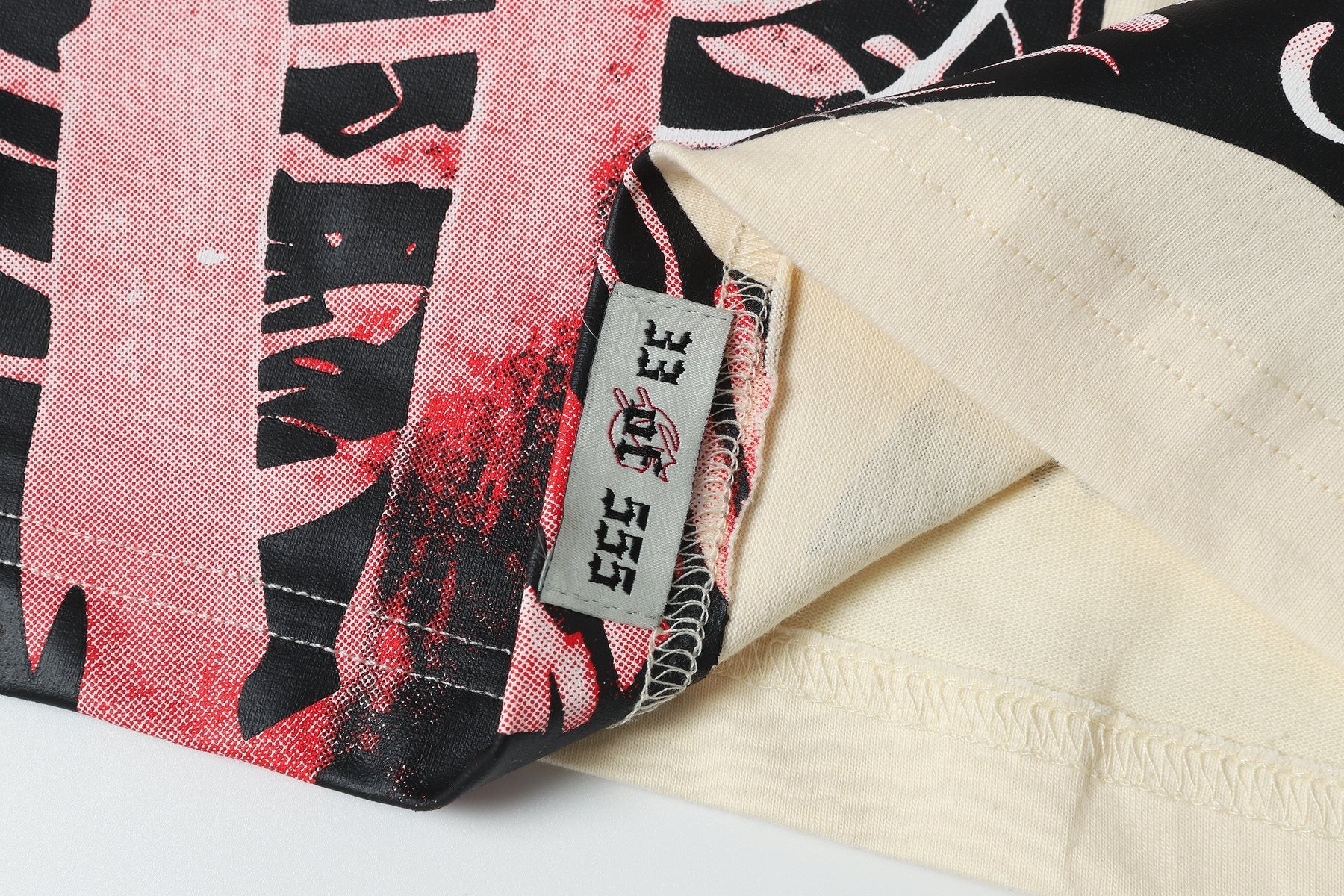 Godspeed Out of Many One Graphic T-Shirt — neck_label