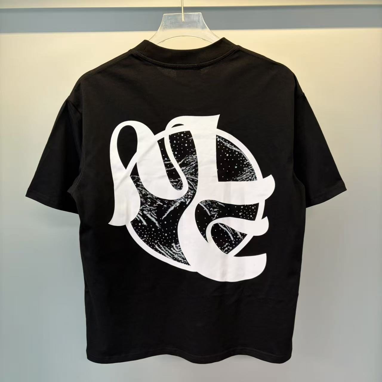 Black Abstract White Wordmark Graphic T-Shirt — front