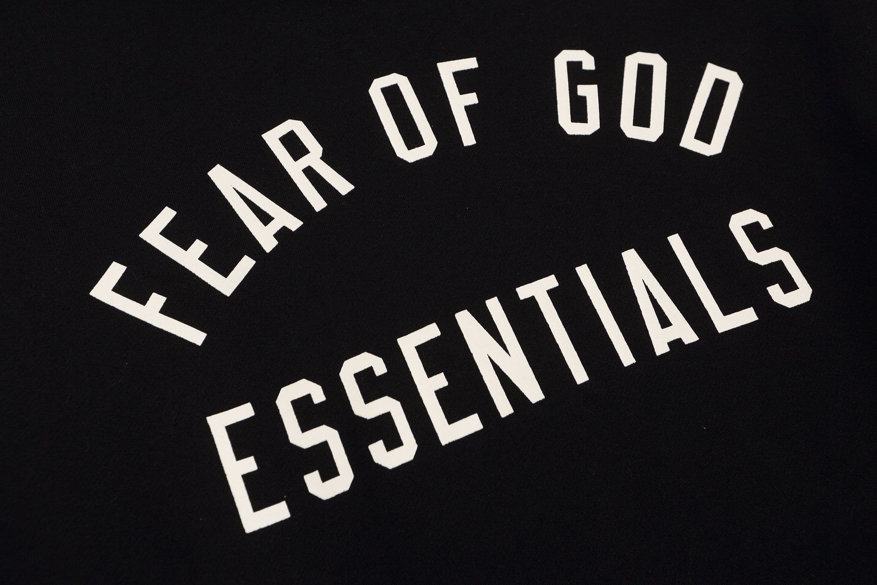 Fear of God Essentials Arched Graphic Hoodie in Black — detail