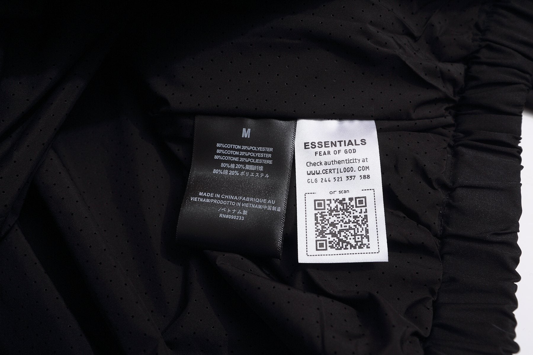 Fear of God Essentials Half-Zip Windbreaker Jacket — neck_label