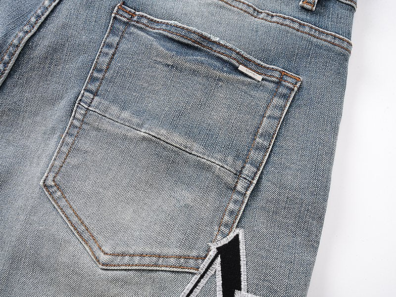 AMIRI Logo Graphic Light Blue Denim Shorts — detail
