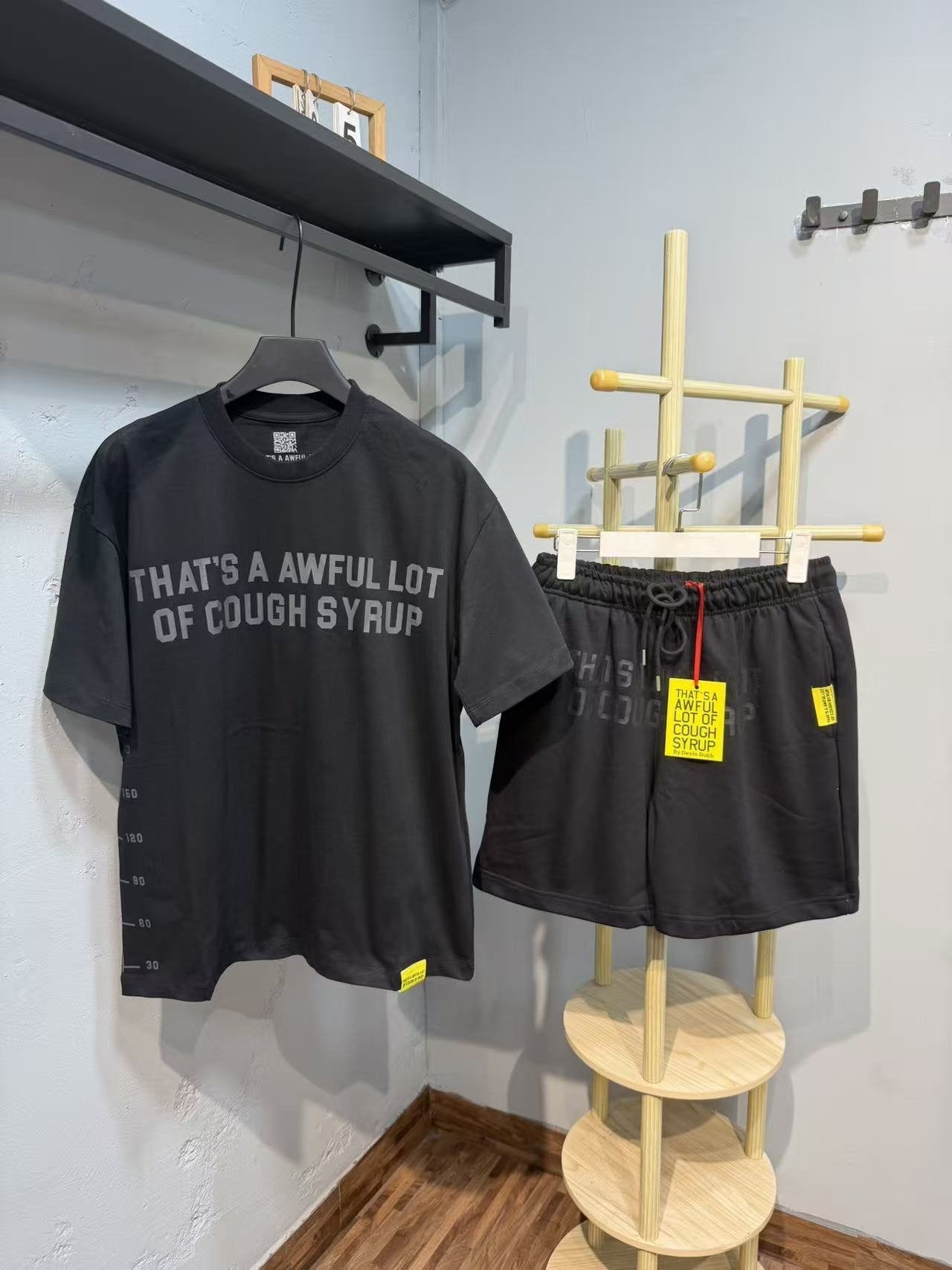 THAT'S A AWFUL LOT OF COUGH SYRUP Graphic Short-Sleeve Set — front