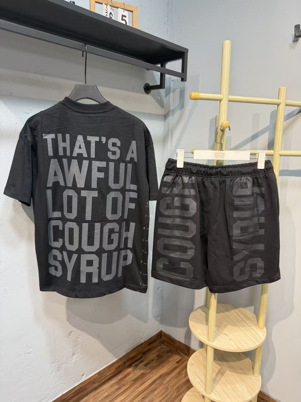 THAT'S A AWFUL LOT OF COUGH SYRUP Graphic Short-Sleeve Set — back