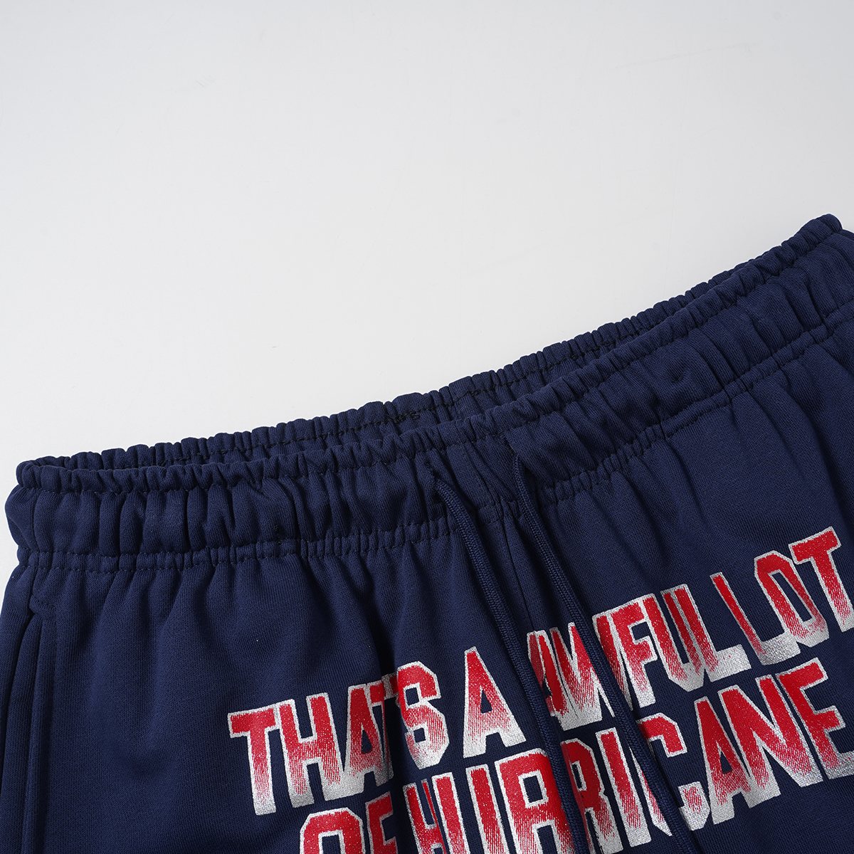 THAT'S A AWFUL LOT OF COUGH SYRUP Navy Graphic Shorts — detail