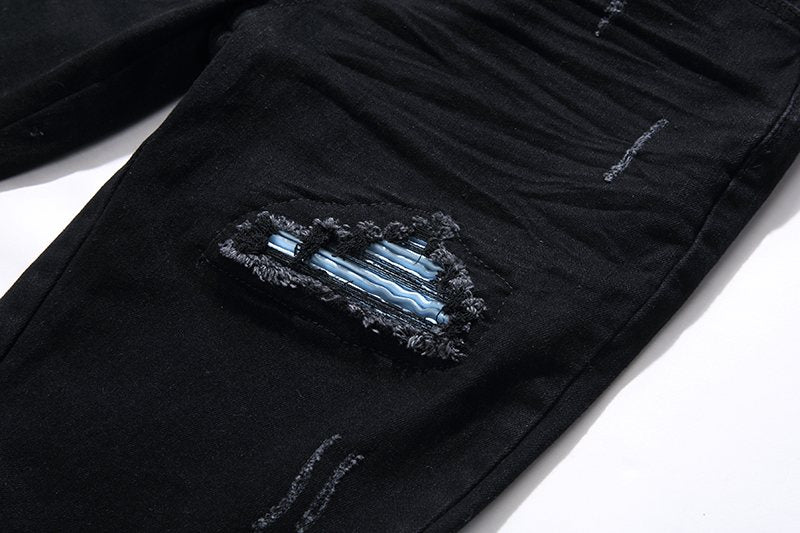 AMIRI Black Distressed Biker Jeans — detail