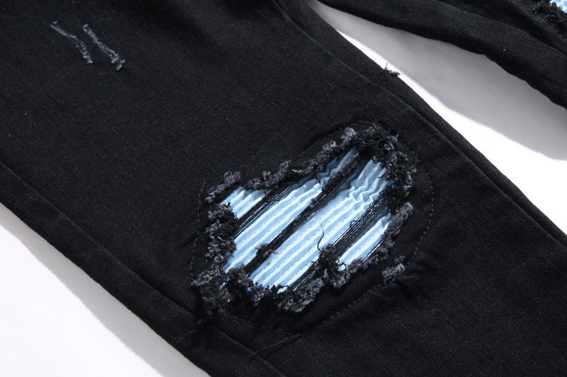 AMIRI Black Distressed Biker Jeans — detail