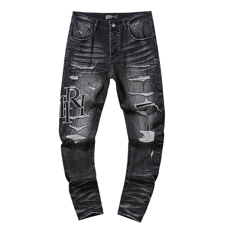 AMIRI Black Distressed Letter Graphic Jeans — hero