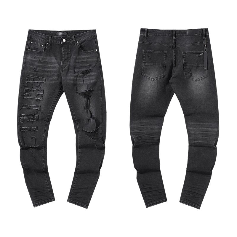 AMIRI Distressed Black Washed Jeans — hero