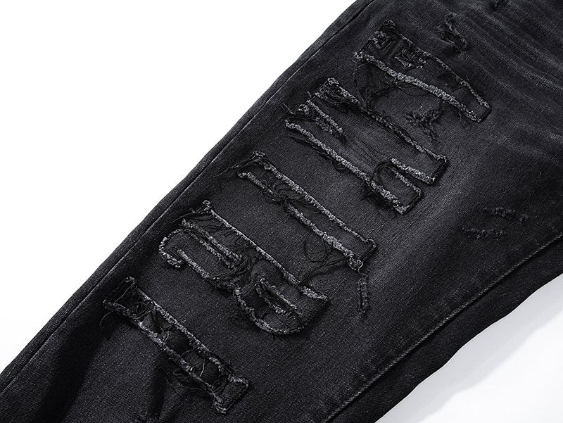 AMIRI Distressed Black Washed Jeans — detail