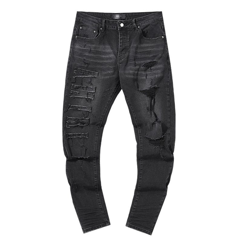 AMIRI Distressed Black Washed Jeans — front