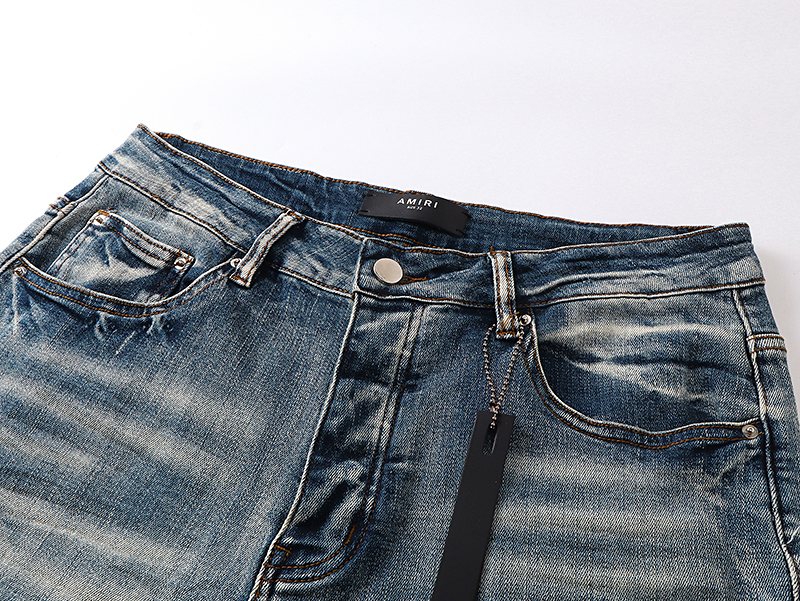 AMIRI Light Blue Distressed Letter Applique Jeans — detail
