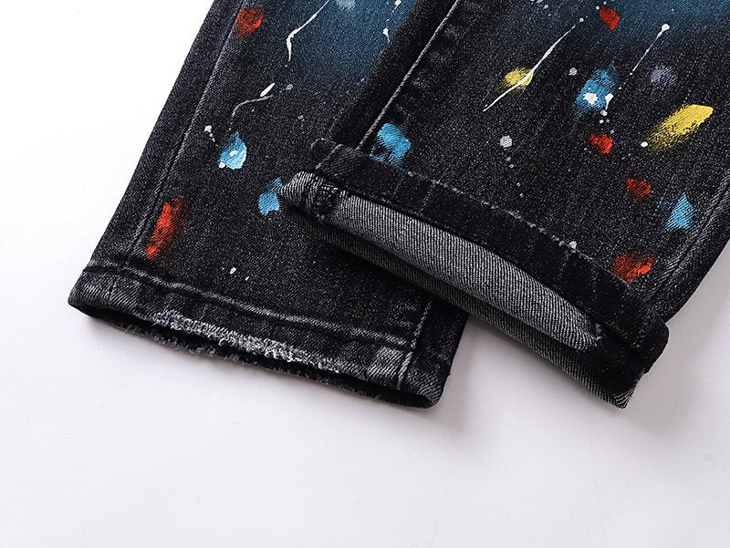 AMIRI Paint Splatter Distressed Black Jeans — detail