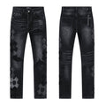 AMIRI Black Floral Distressed Jeans — hero