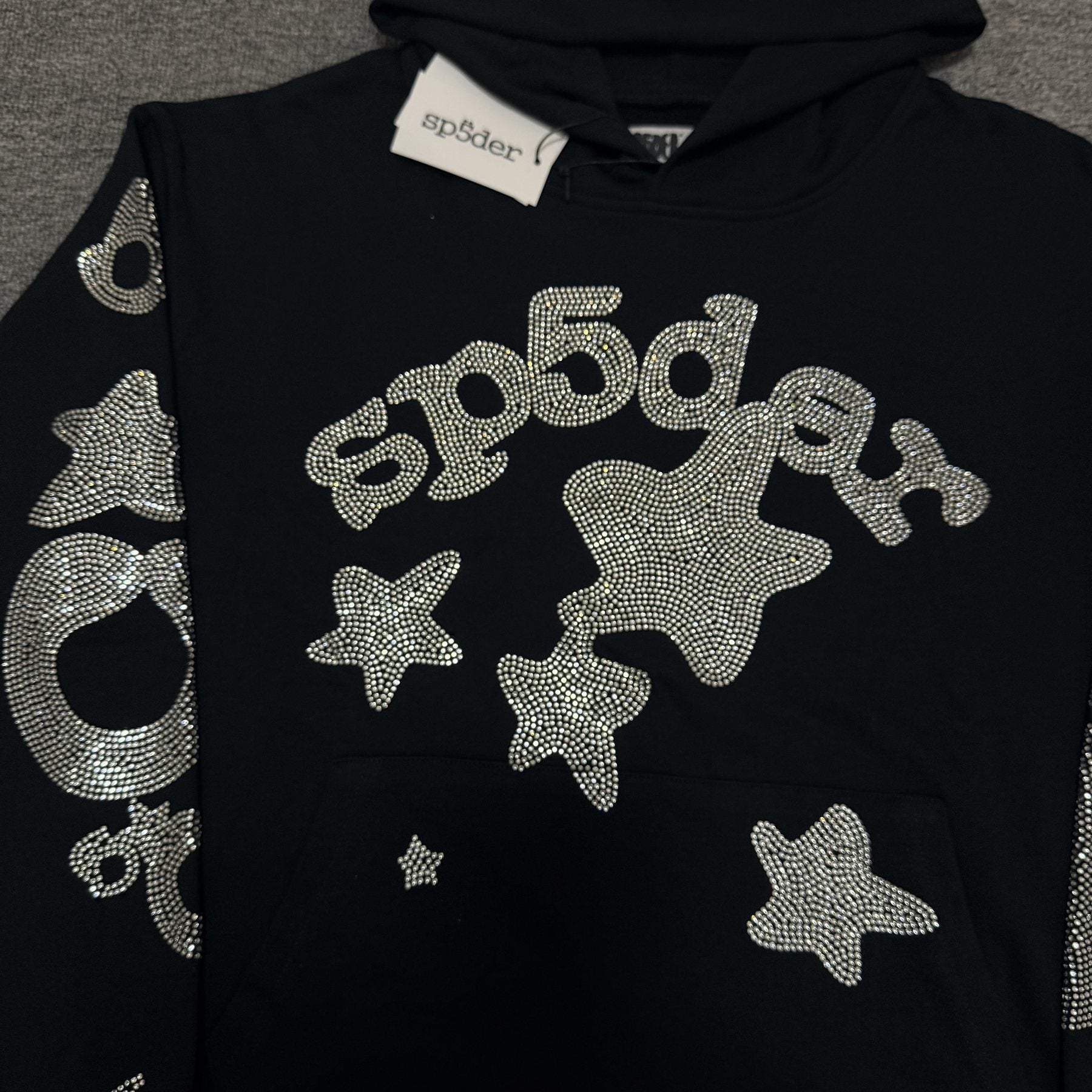 Sp5der Silver Rhinestone-Style Graphic Hoodie — detail