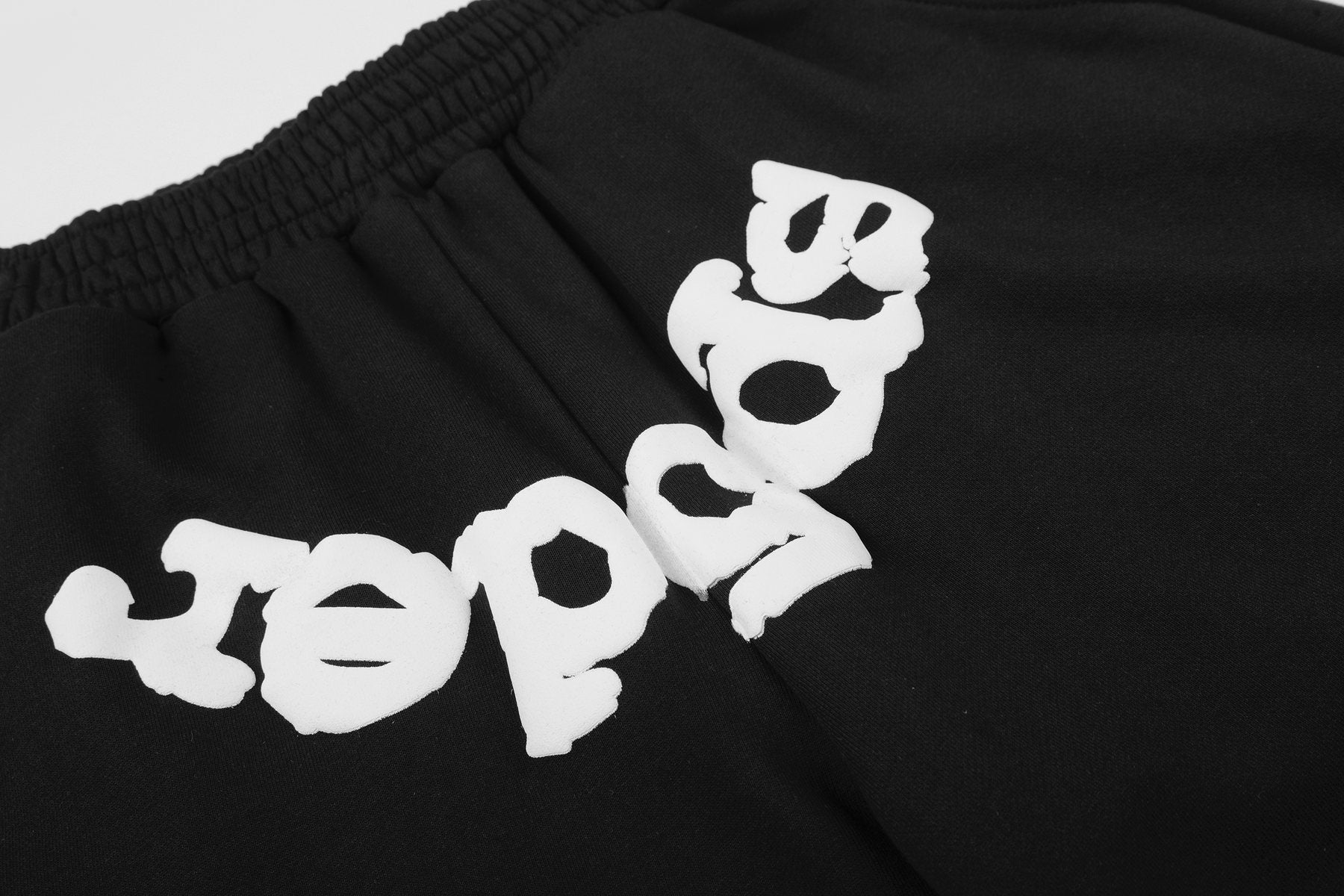 Sp5der Black Graphic Shorts — detail