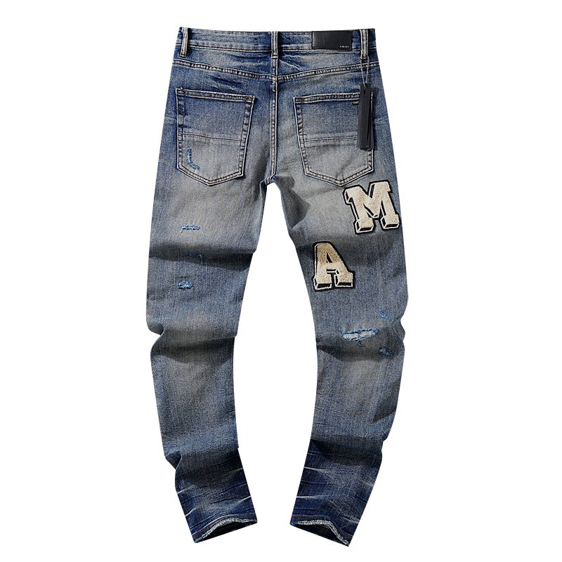 AMIRI Varsity Letter Appliqué Distressed Jeans — back